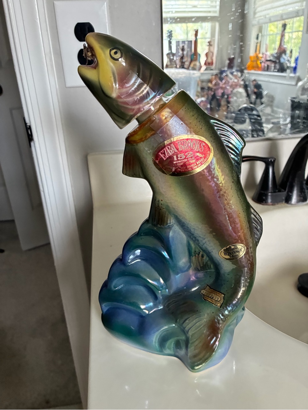 Vintage 1970 Ezra Brooks Rainbow Trout & Fly bourbon whiskey decanter.